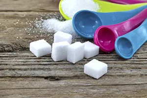 No People In The Scene Prints: Array of sugar presentations on a wooden table