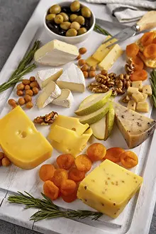 Cheese Platter Ideas Prints: Assorted cheeses with nuts, pears