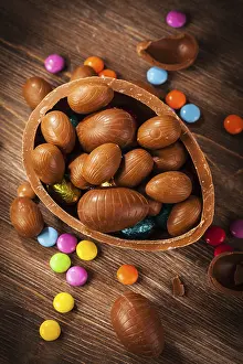 Framed Print : Assorted Chocolate Easter Print on Wooden Background Framed Print : Assorted Chocolate Easter Print on Wooden Background