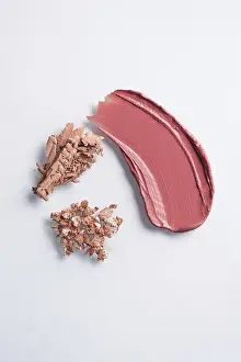 White Background Beauty Products Prints: Assorted cosmetics displayed artistically