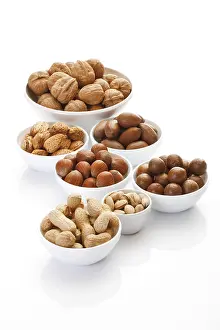 Ceramic Bowls Prints: Assorted nuts in ceramic bowls