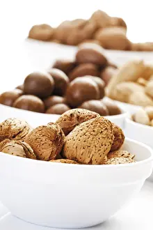 Ceramic Bowls Prints: Assorted nuts in ceramic bowls