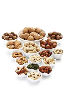 Ceramic Bowls Prints: Assorted nuts and kernels in ceramic bowls