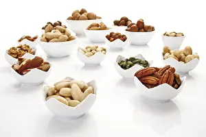 Studio Shot Legumes Prints: Assorted nuts and kernels in ceramic bowls