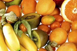 Orange Background Food Photography Prints: Assorted orange fruit on white background