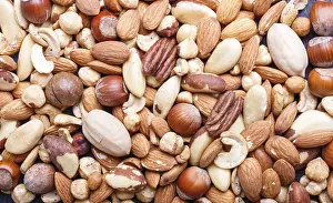 Studio Shot Of Nuts Prints: Background and texture made from different kinds of nuts