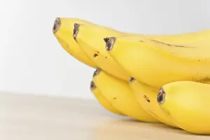 Ripe Banana Nutrition Facts Prints: Bananas on a table