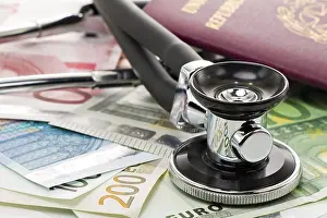 Paper Money Transactions Prints: Banknotes with stethoscope