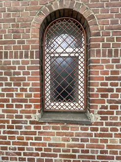 Deserted Building Exterior Prints: Barred window in brick wall