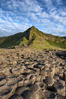 Irish Coastline Photography Prints: Basalt columns by the coast at sunset