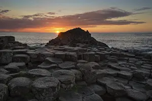 Giant's Causeway Prints: Basalt columns by the coast at sunset