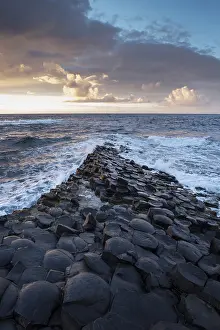 Irish Coastline Images Prints: Basalt columns by the coast at sunset