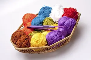 Handicraft Background Prints: Basket with thread and balls for knitting as a background