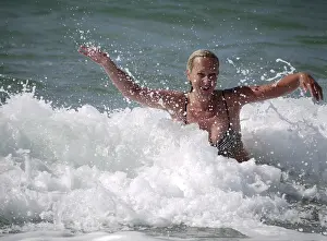 Woman In Bikini Prints: Bathing in the surf