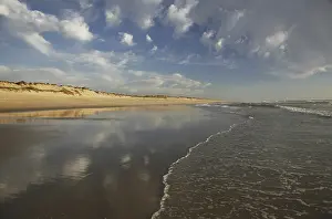 Evening Light In Southern Europe Prints: Beach and clouds in the evening light