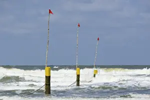 Deserted Sandy Beach Scene Prints: Beach limit marker posts, Norderney