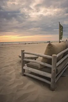 Atmospheric Beach Photography Prints: Beach Sofa on the beach at sunset