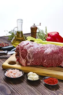 Beef Fillet Prints: Beef fillet with vegetables on kitchen table