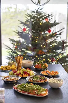 Italian Meal Starter Ideas Prints: A black table fully set with various appetizers