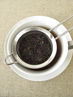 Hot Beverage Prints: Black tea in a tea strainer
