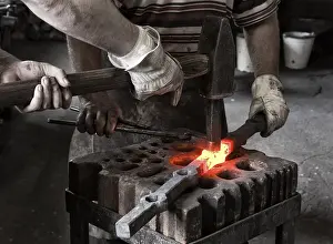 German Craftsman Prints: Blacksmith and his assistant at work