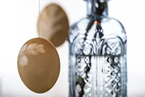 Colourful Easter Traditions Prints: Blown out Easter eggs, a light blue vase in the background