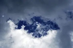 Cloudy Weather Conditions Prints: Blue sky between dark clouds