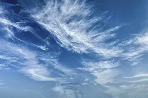 Fluffy Cloud Formation Prints: Blue sky with white clouds