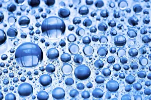 Abstract Rainy Scene Prints: Blue water drops background close up