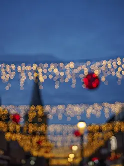 Deserted Streets At Night Prints: Blurred string of lights at night with bokeh effect