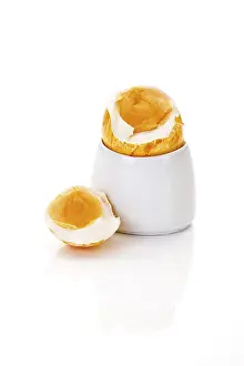 Coloured Easter Eggs Prints: Boiled breakfast easter egg in an egg cup
