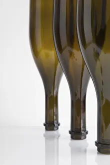 Empty Wine Bottles Prints: Three empty bottles of wine