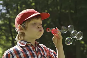 Summer Recreational Activity Prints: Boy blowing soap bubbles