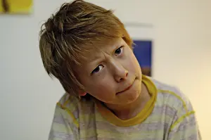 Facial Expression Of A Child Prints: Boy looking tense