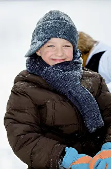 Snowy Day Leisure Activities Prints: Boy playing in the snow