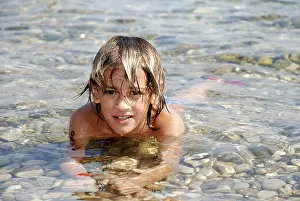 Holiday Resort Photography Prints: Boy at seashore