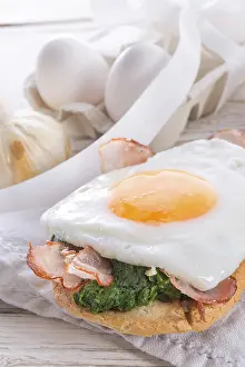 European Breakfast Ideas Prints: Bread au gratin with fried egg and spinach