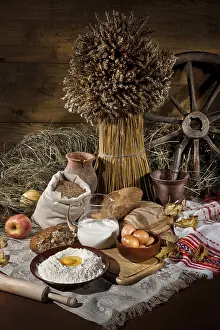 Still Life Studio Photos Prints: Bread, flowers, ild tableware on a canvas studio background