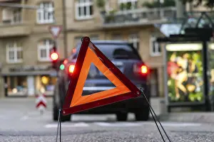 Empty Roads In Southern Germany Prints: Breakdown vehicle with warning triangle