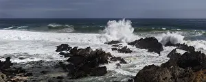 Wave Crash On Rocky Shore Prints: Breaking waves between rocks on the beach