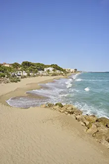 Spanish Coastline Prints: Breaking waves on a sandy beach