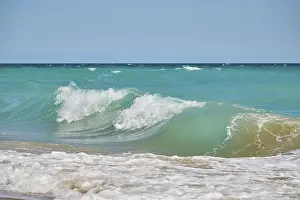 Tarragona Beach Prints: Breaking waves on a sandy beach