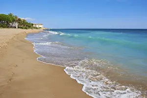 Sandy Ocean Beaches Prints: Breaking waves on a sandy beach