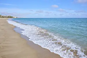 Spanish Coast Prints: Breaking waves on a sandy beach