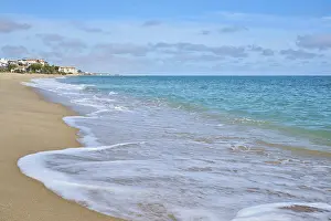 Spanish Coastline Prints: Breaking waves on a sandy beach