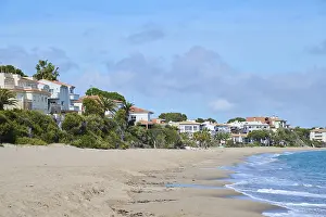 Spanish Coastline Prints: Breaking waves on a sandy beach