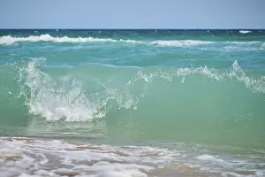 Spanish Coast Prints: Breaking waves on a sandy beach