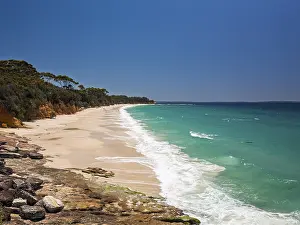 Coastal Scenery Prints: A breathtaking view of a pristine sandy beach