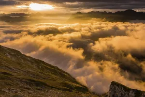 Deserted Mountainous Region Prints: Bregenzerwald mountains with clouds below
