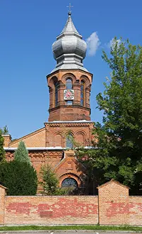 Eastern European Religious Buildings Prints: Brick tower with clock and cross